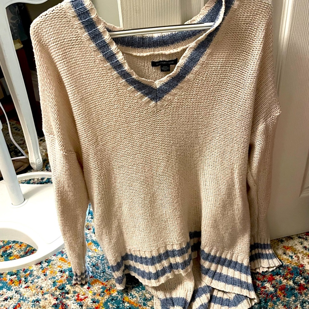 Tan and blue striped AE slouch sweater.
